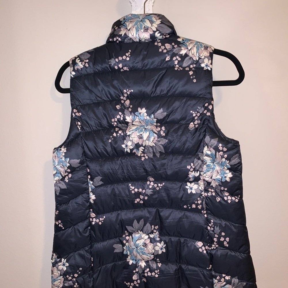 Blue flowery vest.